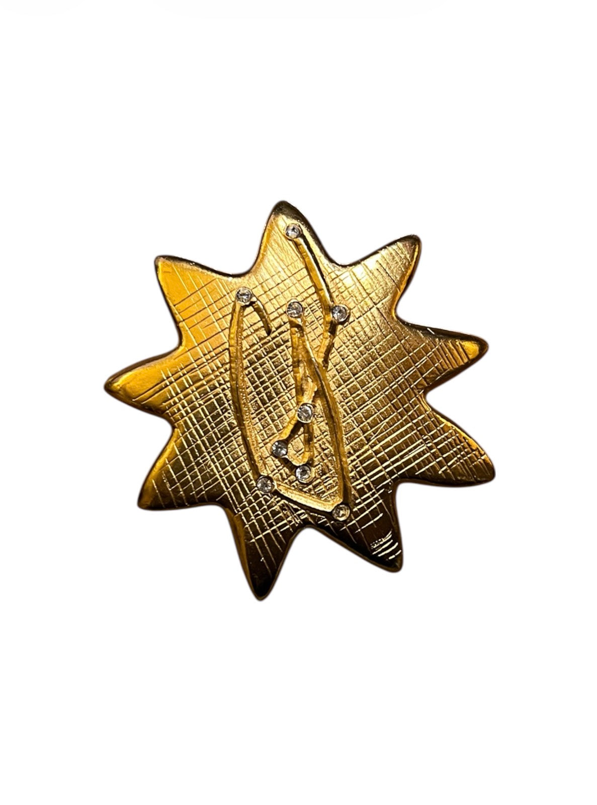 Christian Lacroix golden star brooch