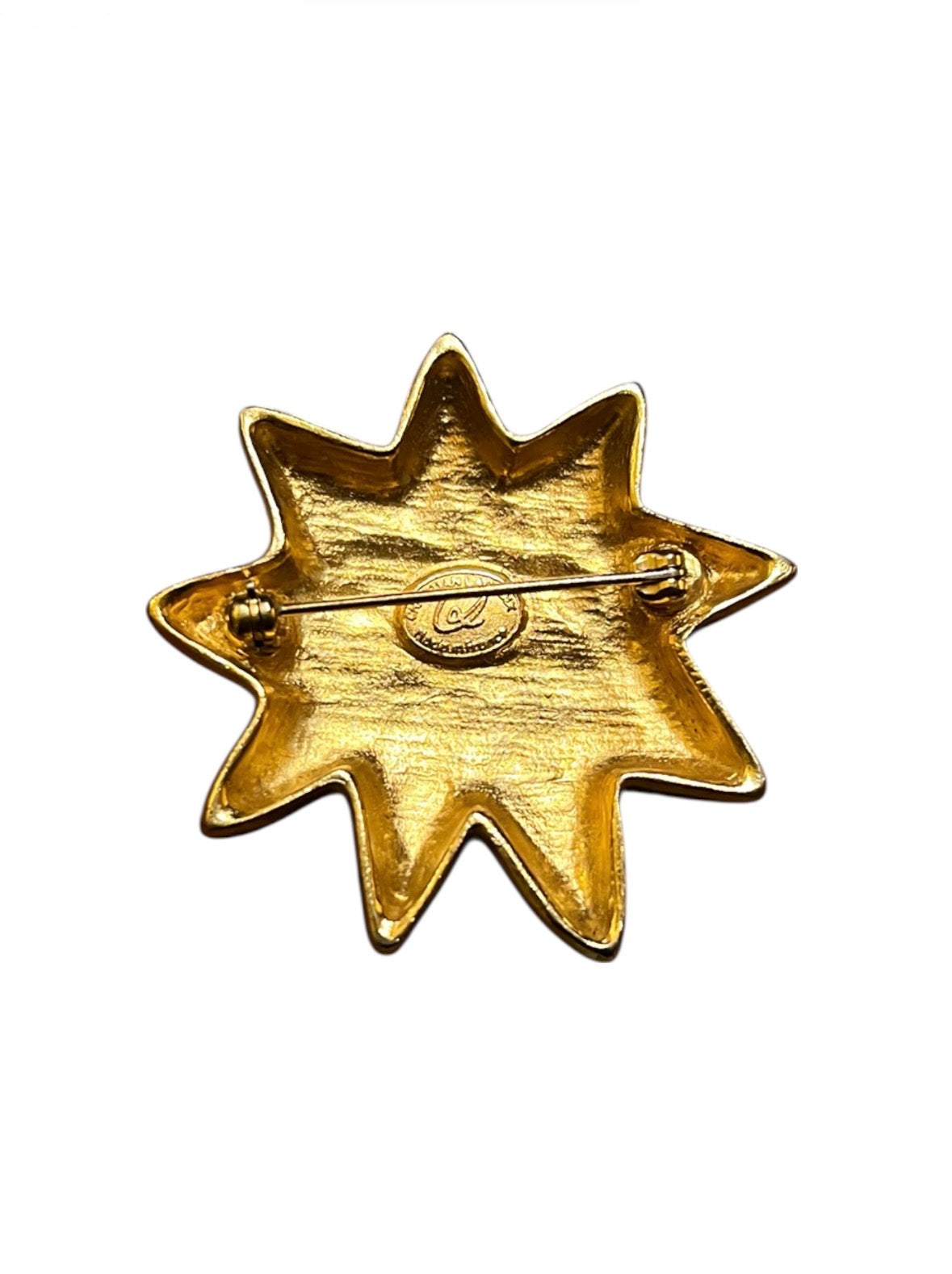 Christian Lacroix golden star brooch