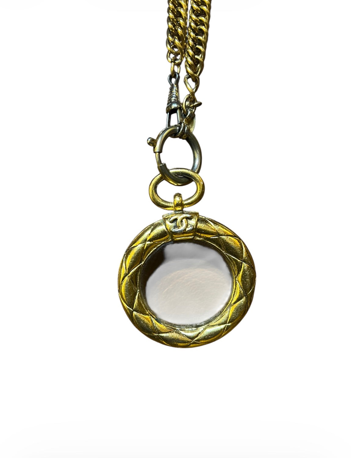 Elegant Chanel golden loupe CC necklace