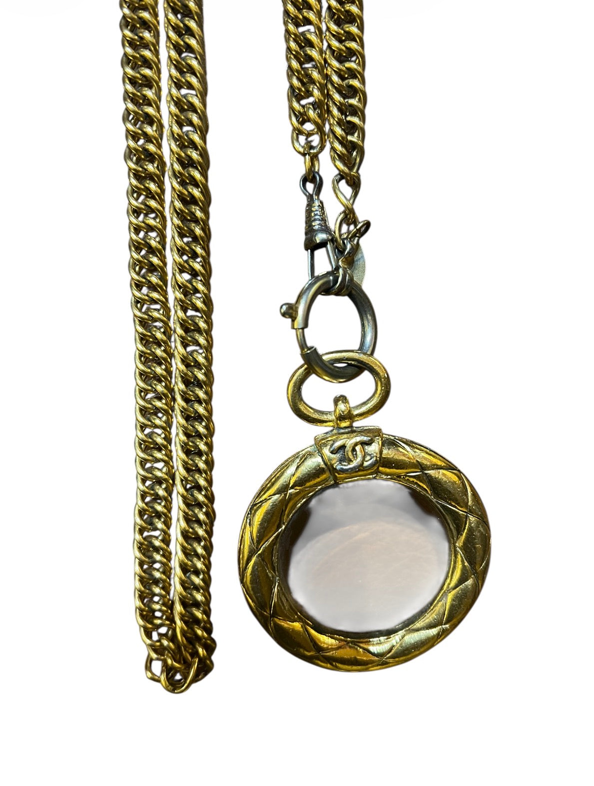 Elegant Chanel golden loupe CC necklace