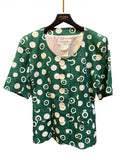 1994 Yves Saint Laurent green and white patterned tailored jacket