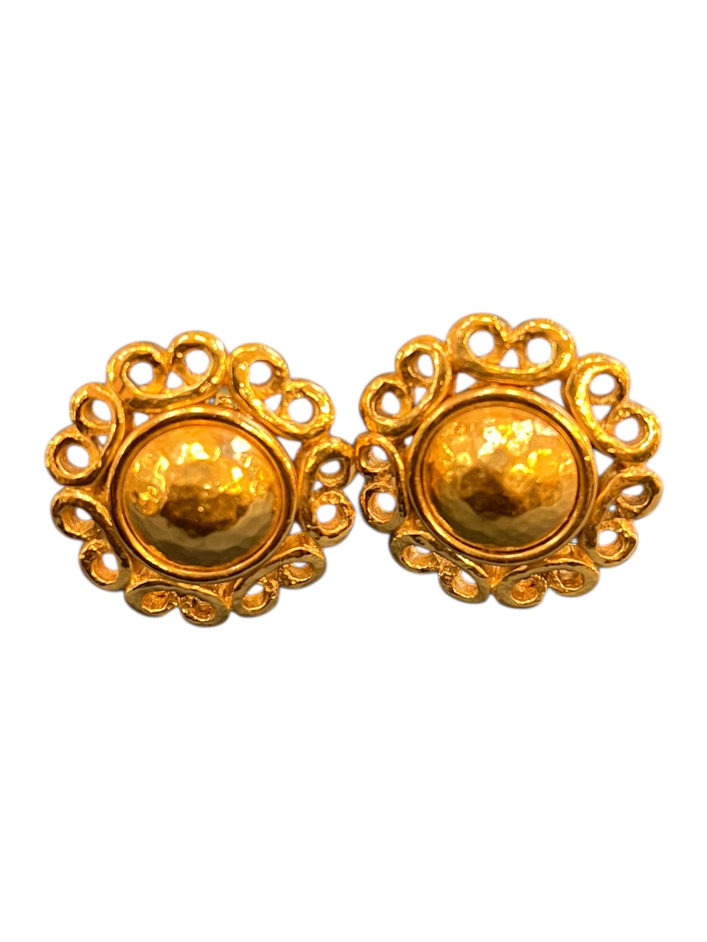 Golden clip-on earrings by Yves Saint Laurent