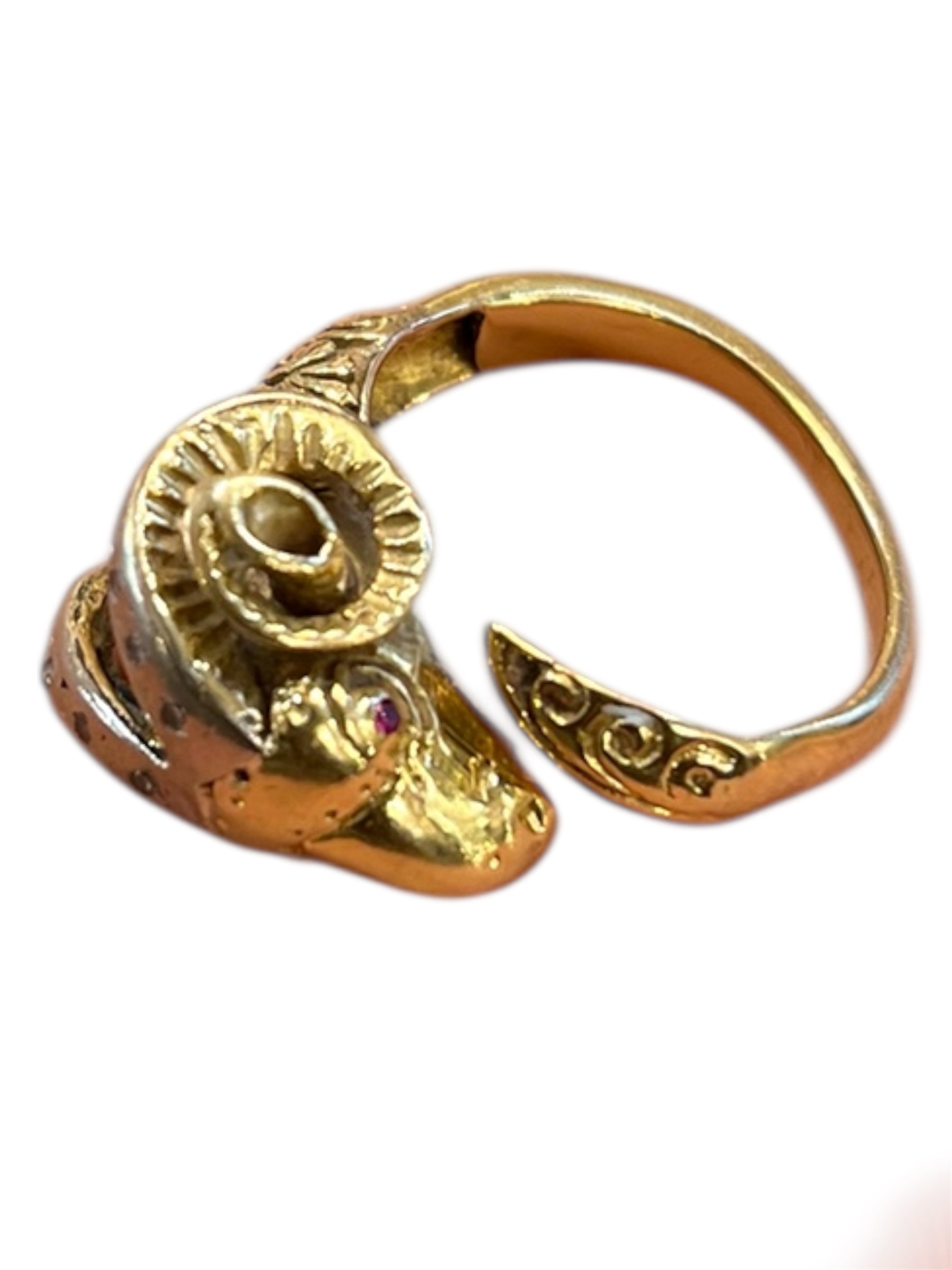 Open-band ring featuring a striking ram's