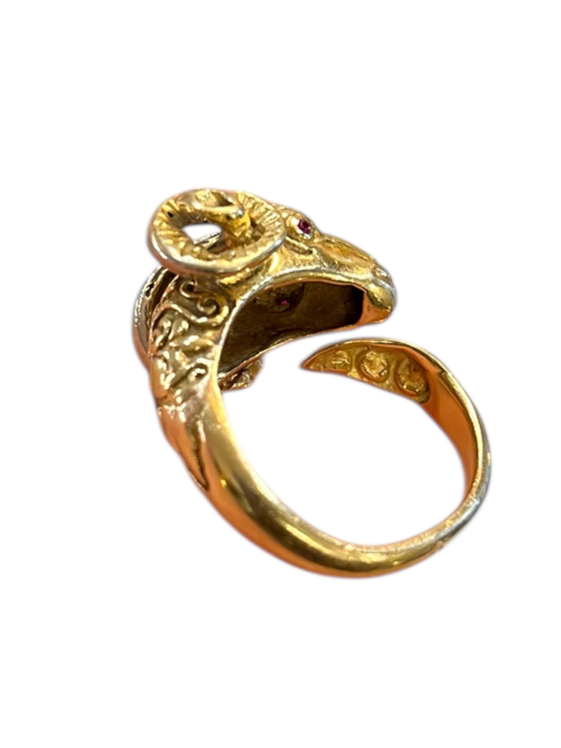 Open-band ring featuring a striking ram's