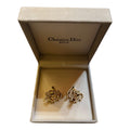 Christian Dior Golden clip-on earrings with pearls